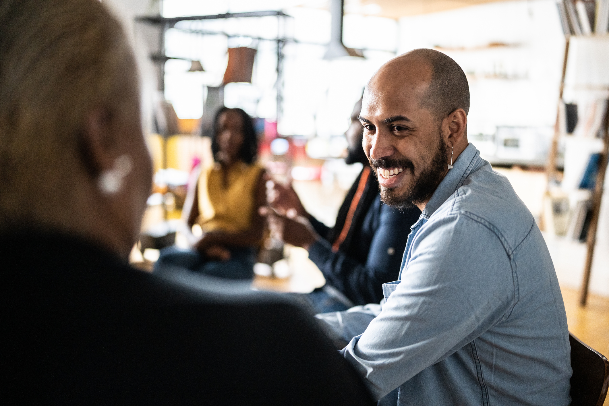 A mixed raced male youth support worker